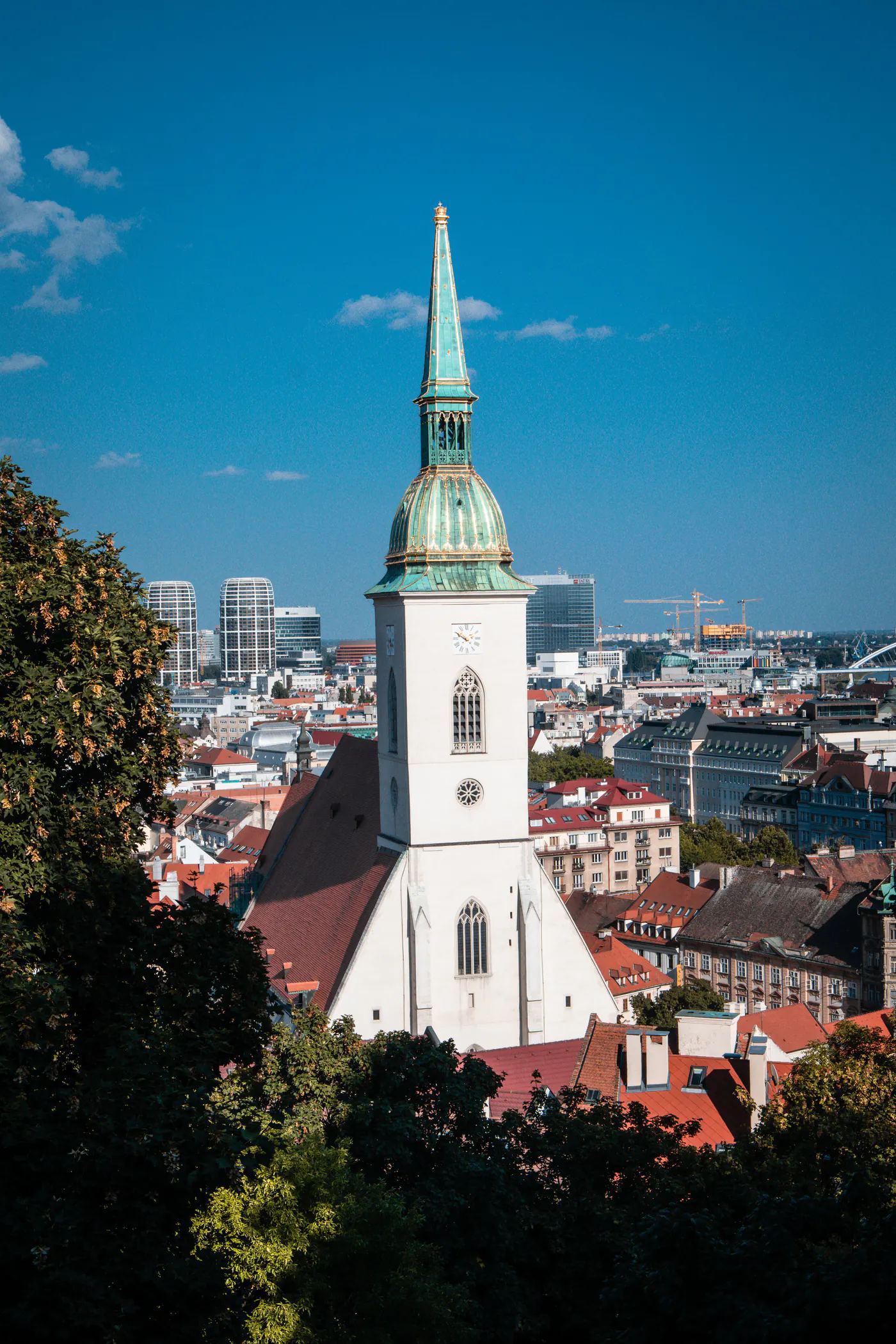 St Martin's Cathedral in Bratislava with the city's business district behind it